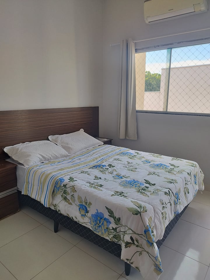 Bedroom with bathroom and balcony
