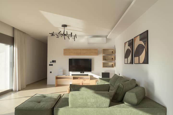 Design open space con accesso diretto alla terrazza per una vita indoor-outdoor senza soluzione di continuità.