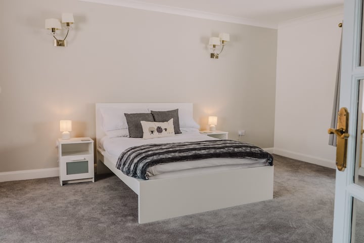 In this bedroom you will find two double beds.