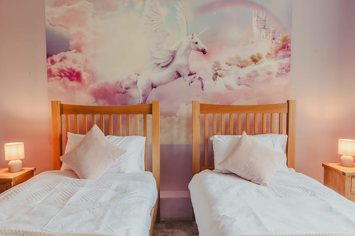 Cheerful twin room, thoughtfully decorated with children in mind.