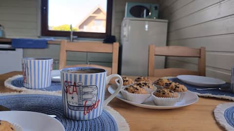 Top performing Airbnb: Comfortable cabin with playground for kids. in Gmina Choczewo