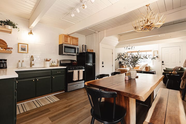 Enjoy the open concept living and dining space. The dining table has plenty of room for a nice home cooked meal or to play board games on.