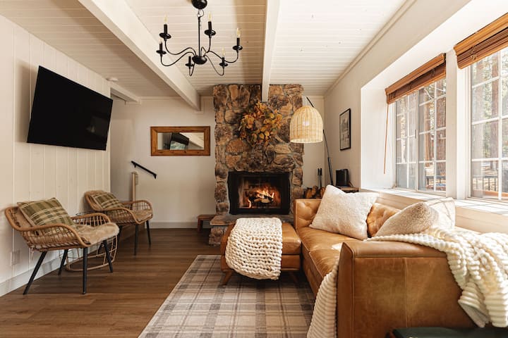 Cozy up by the stone fireplace