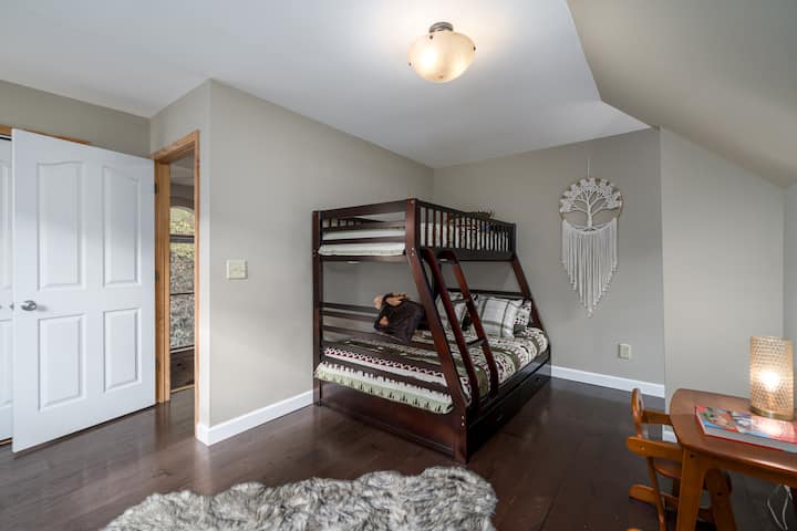 Full bed and twin top bed. Upstairs, shares the bath with bedroom 2.