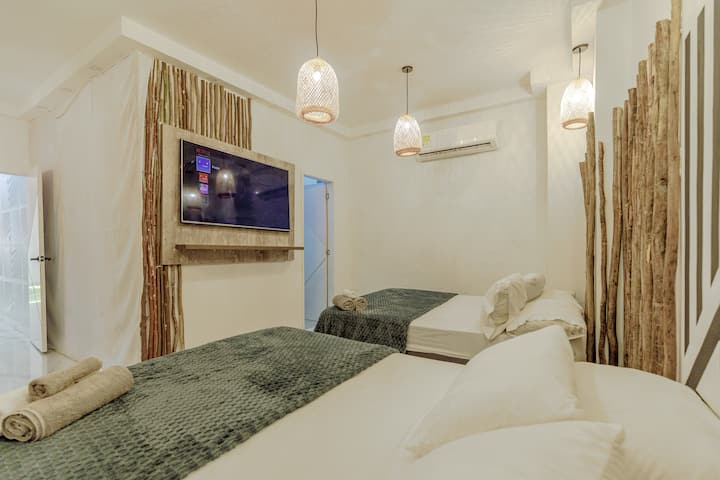 ️ Chambre 1 – Premier étage : connexion Internet Wi-Fi + télévision