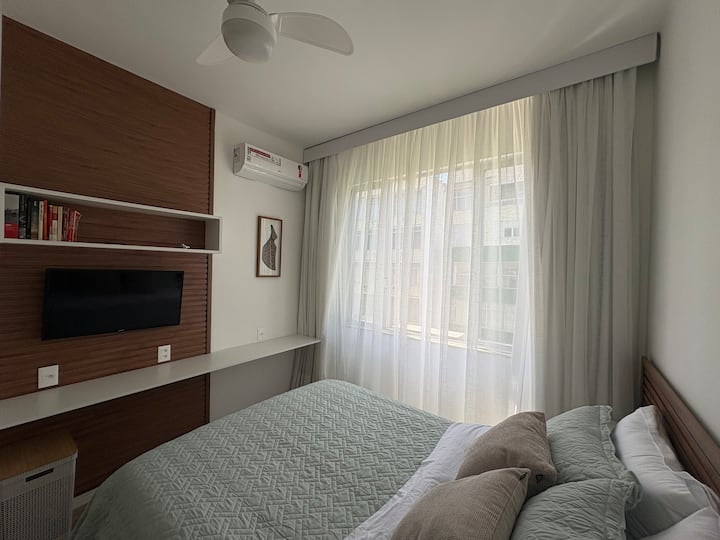 Double bed with smart tv and silent modern air conditioning.