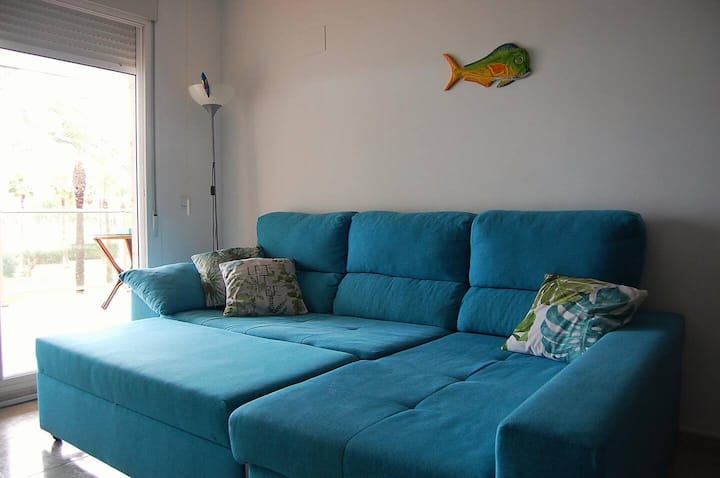 Large sofa bed in extended/bed mode. There are also direct ocean views from the sofa bed.