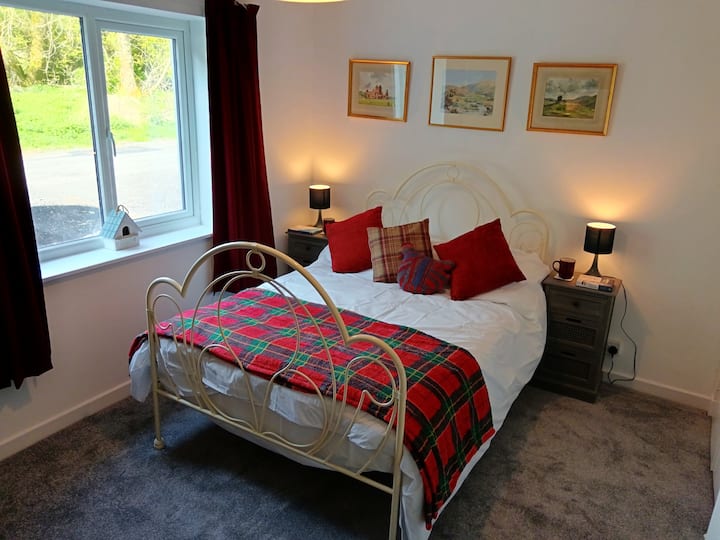 Beautifully designed bedroom with a double bed, dresser with drawers, bedroom chair and inbuilt wardrobe space. With thermal blackout curtains and 400 thread count cotton sheets; you are sure to have a comfortable night's sleep!