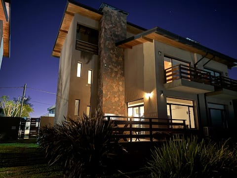 Triplex in a residential complex facing the river