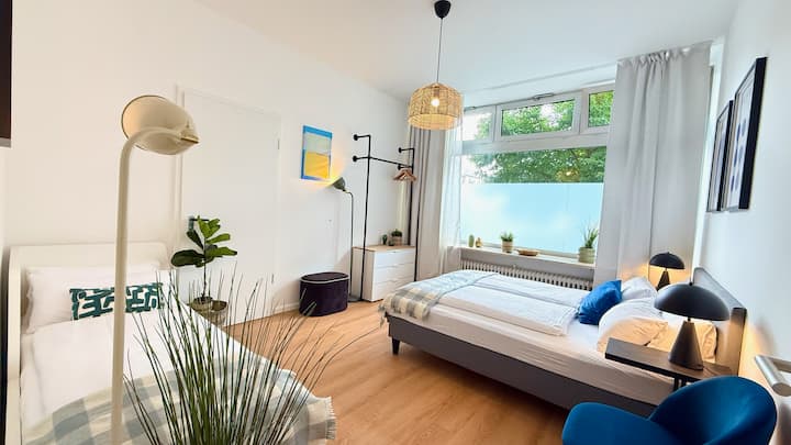 Une des trois chambres spacieuses avec deux lits doubles