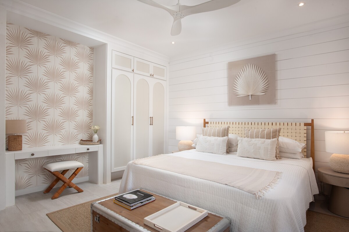 Well appointed bedroom 2 has a UK king size bed, air conditioning, ceiling fan and a beautiful en suite shower room.