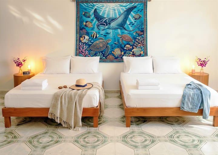 Have restful sleep in the heart of Playa! ✨ Sink into your plush matrimonial beds, wrapped in soft, fresh linens designed for total comfort. After a day of sun and adventure, your serene tropical suite awaits—so you can wake up feeling refreshed.