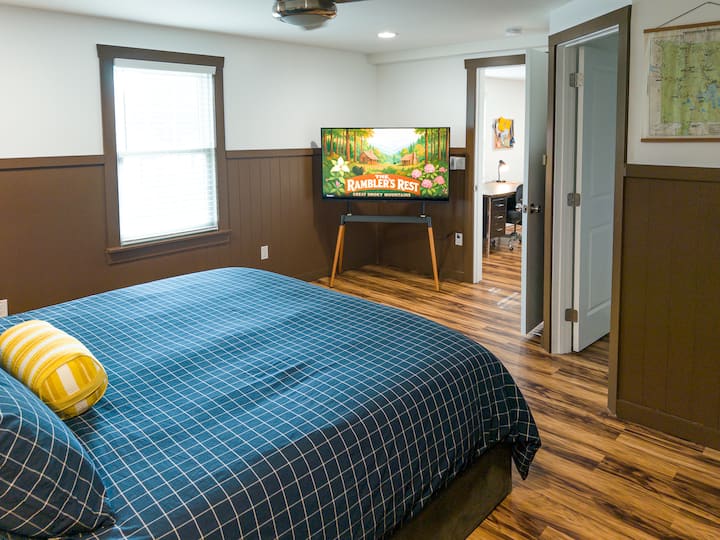 King size foam mattress and plush mattress topper. Walk-in closet. 55" smart TV.