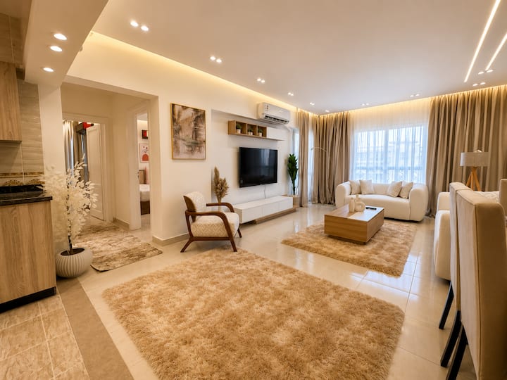 Paradise 2BDR In Rehab City: Living room