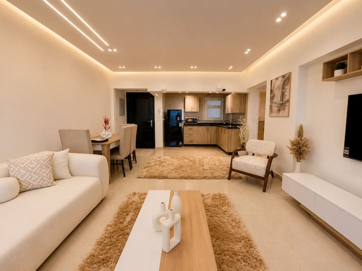 Paradise 2BDR In Rehab City: Living room