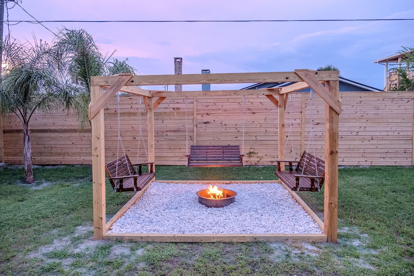 Fenced backyard with hot tub, covered deck and fire pit, Luxury Beach Haven, Palm Coast, Florida