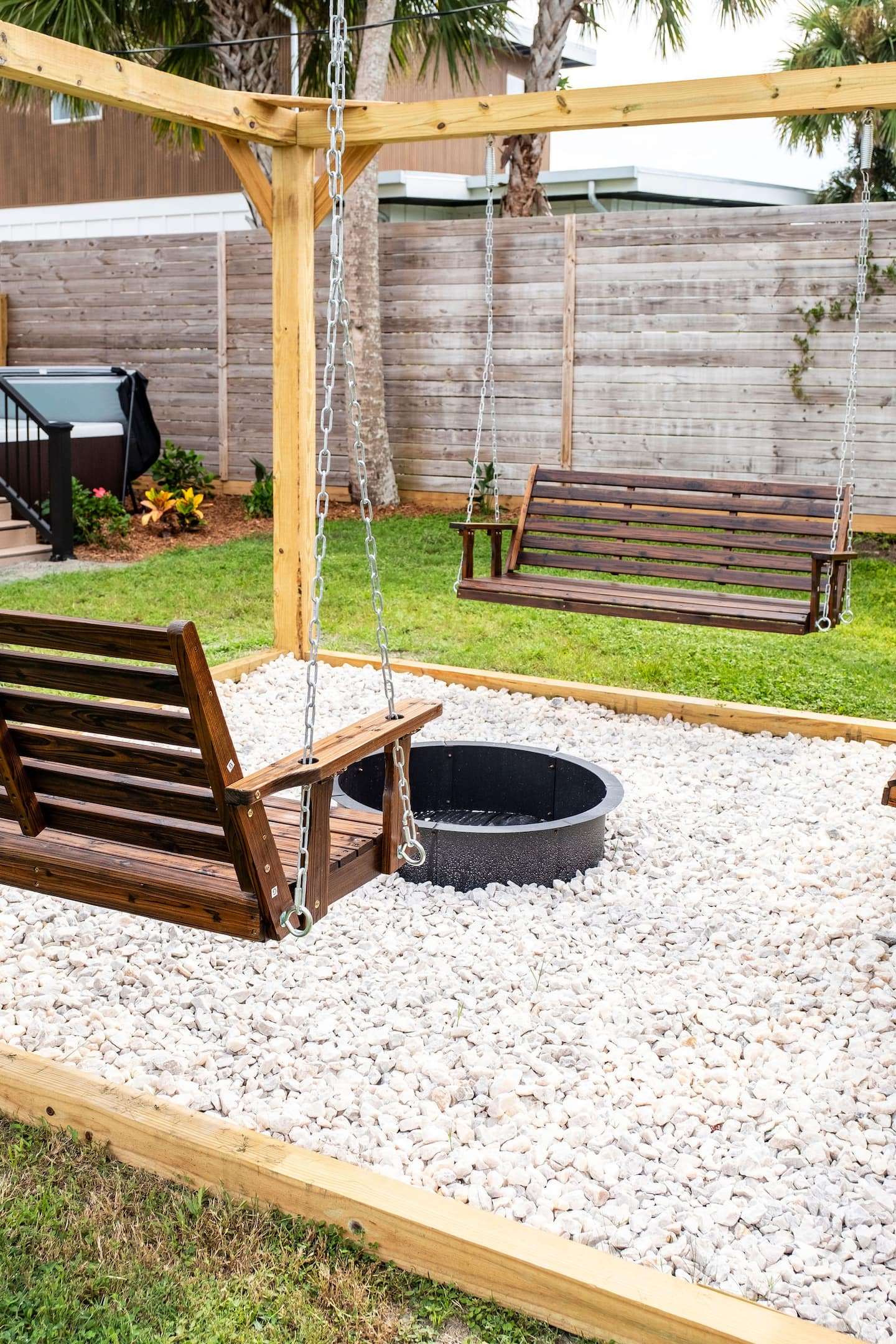 Fenced backyard with hot tub, covered deck and fire pit, Luxury Beach Haven, Palm Coast, Florida