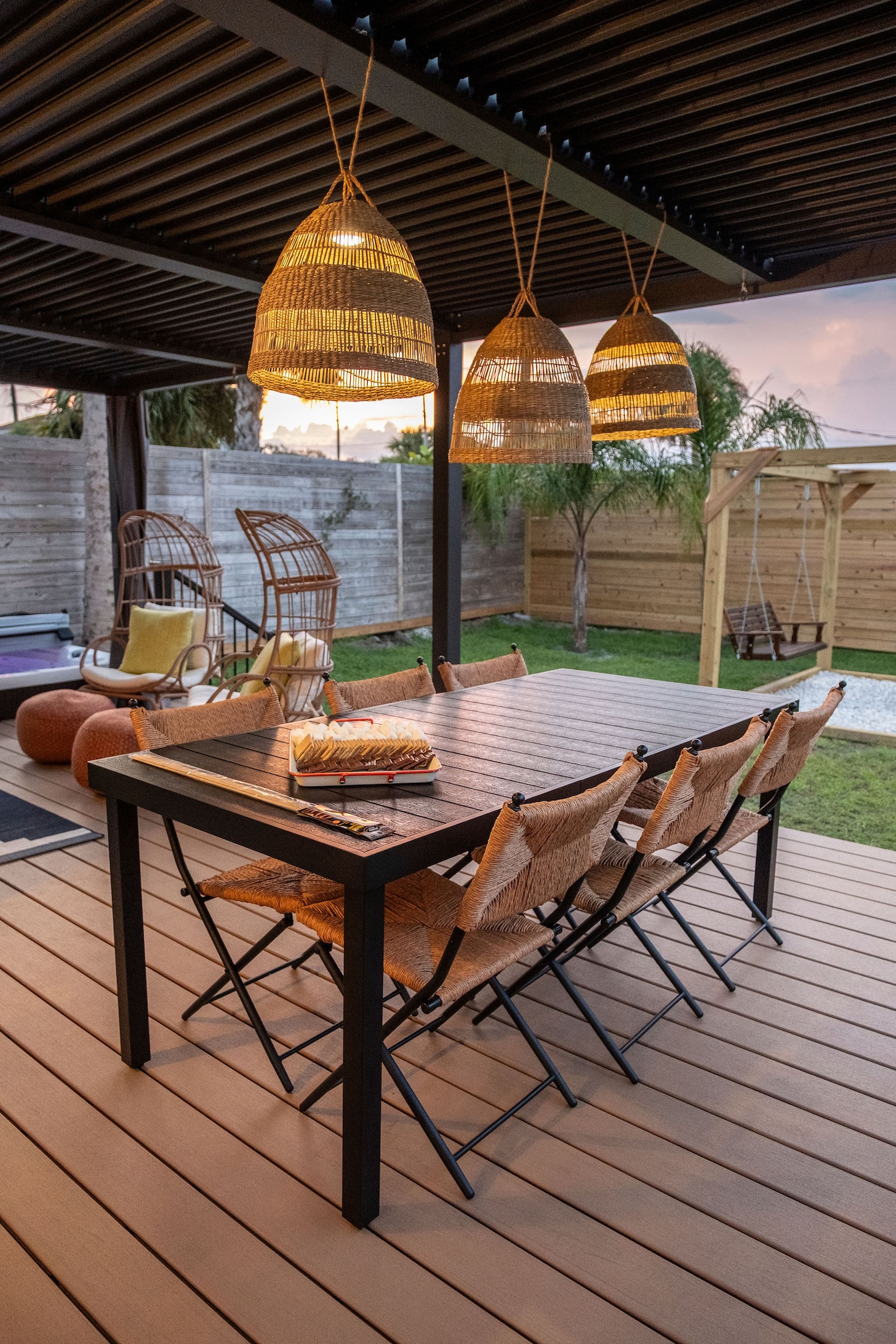 Fenced backyard with hot tub, covered deck and fire pit, Luxury Beach Haven, Palm Coast, Florida