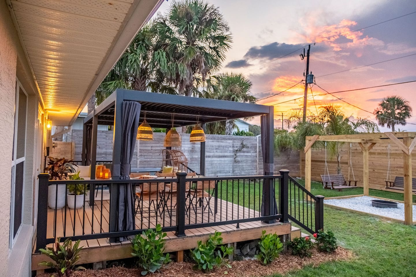 Fenced backyard with hot tub, covered deck and fire pit, Luxury Beach Haven, Palm Coast, Florida