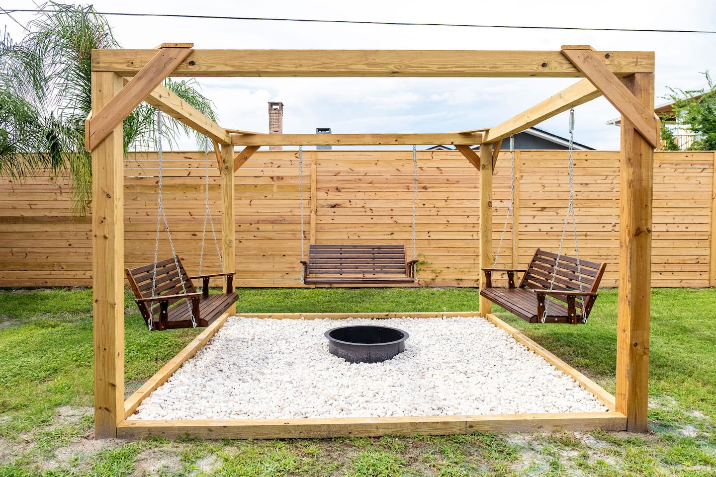 Fenced backyard with hot tub, covered deck and fire pit, Luxury Beach Haven, Palm Coast, Florida