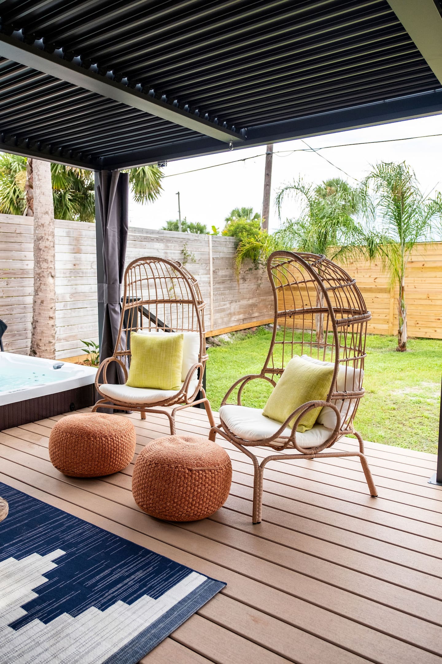 Fenced backyard with hot tub, covered deck and fire pit, Luxury Beach Haven, Palm Coast, Florida