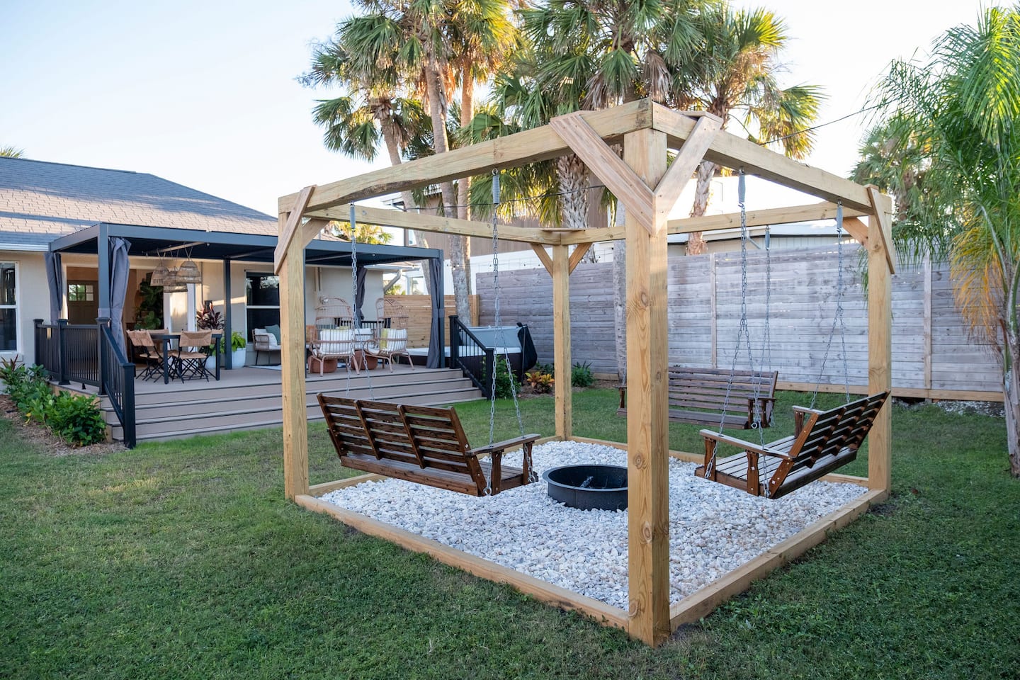 Fenced backyard with hot tub, covered deck and fire pit, Luxury Beach Haven, Palm Coast, Florida