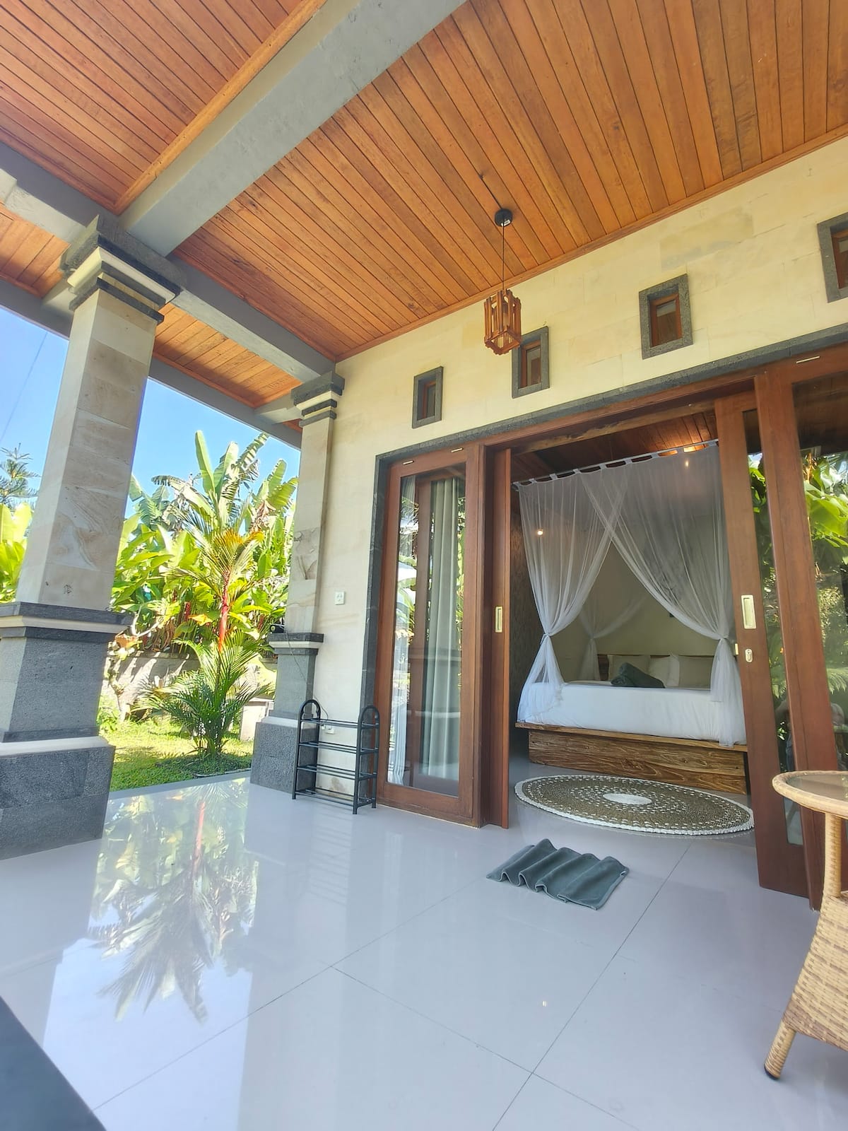 Yasha House garden suite in Payangan near Ubud, Bali — private entrance with tropical garden