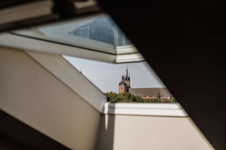 Two-Level Apartment with Bathtub in Bedroom