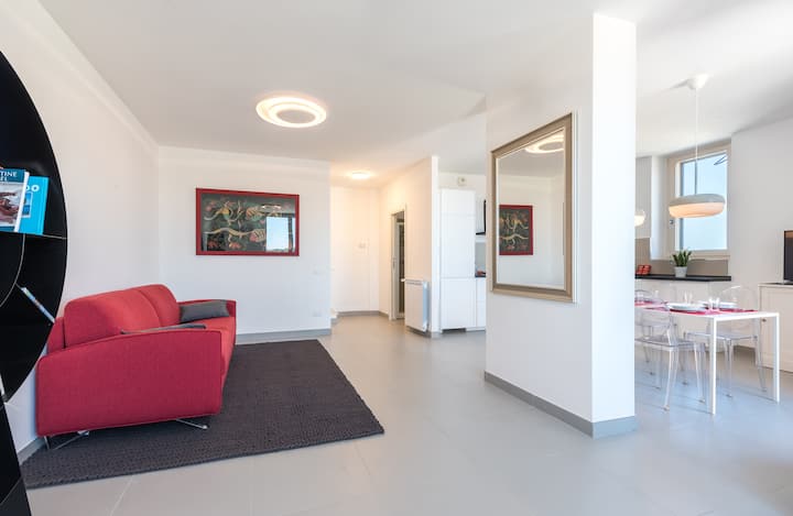 Tweepersoonsslaapbank met uitzicht op de keuken