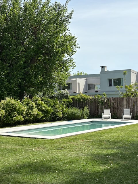Warm and bright house surrounded by greenery