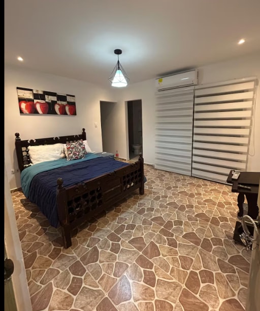 Soba s klima-uređajem i udobnim krevetom koji vam pruža najbolji odmor