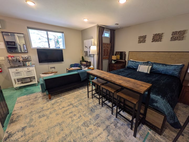 Your bedroom/living space on the south side of the cottage is compact but VERY cozy!