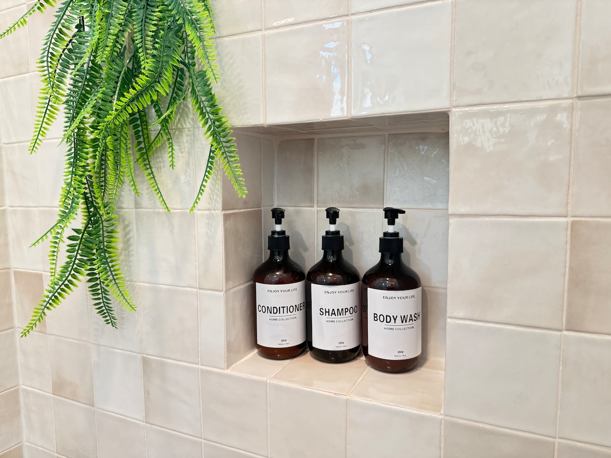 Luxury Guest Suite · Walk-in Shower · Cozy Patio