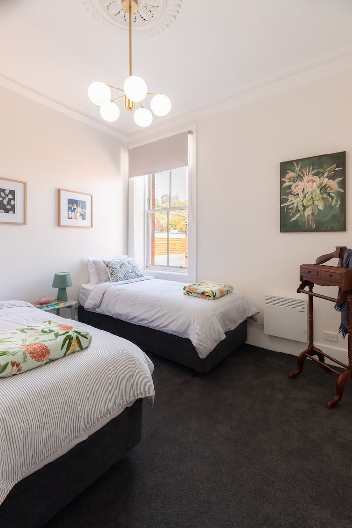 Extra long single beds with premium mattresses, can be converted to a king sized bed on request.  