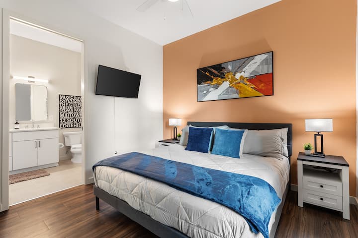 Comfortable King bed with a Smart TV, large closet, and ensuite bathroom.