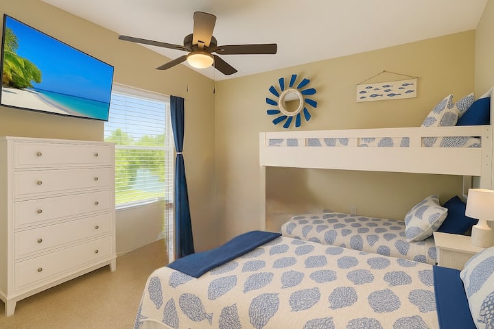The "fish" bedroom is complete with full sized bed and 2 twin bunks.  Lots of storage -closet, dresser, nightstand. USB/reading lights on each bunk and by the bed. 