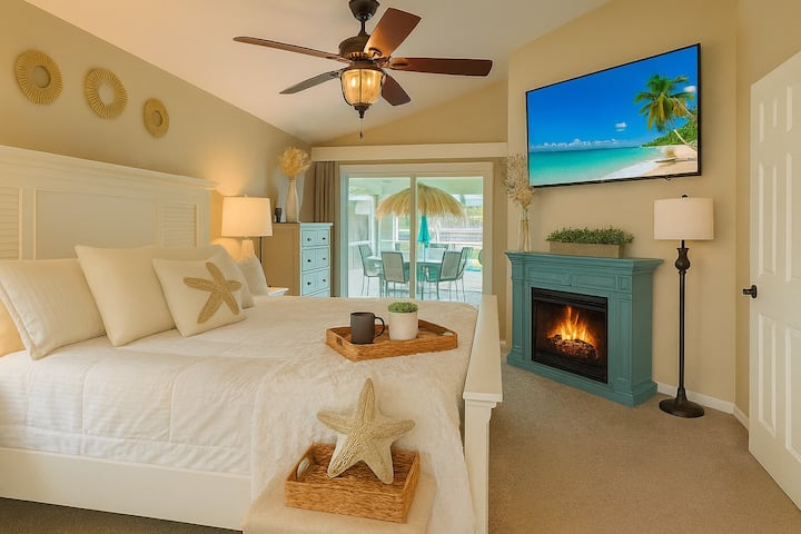 Beautiful master suite with luxury king sized green tea memory foam mattress, fireplace, Smart TV, ensuite bath, and walk-in closet.  USB/C chargers on each nightstand.