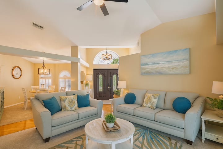 Spacious living room, entry and dining area.