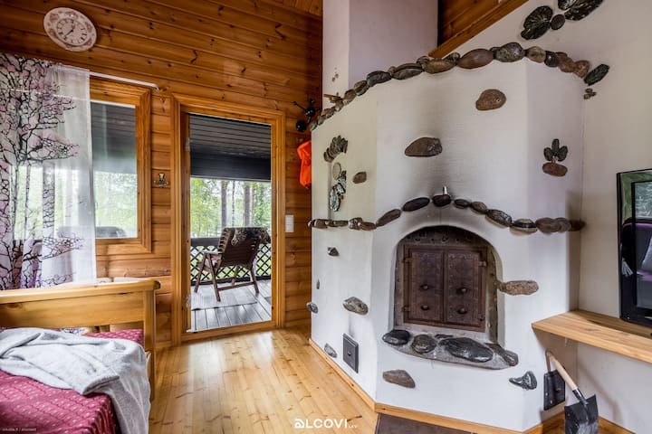 Sauna cabaña dormitorio y reservación chimenea