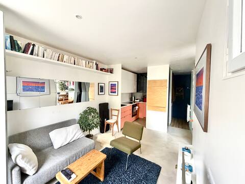 Top performing Airbnb: Mini loft-style apartment with terrace in Saint Ouen Sur Seine