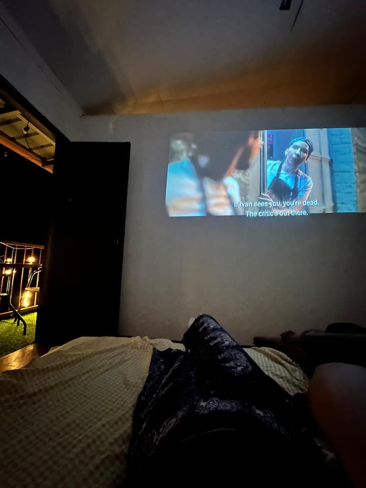 Netflix in bedroom? Yes! You can enjoy watching your fav netflix movie while feeling cozy under the soft blanket and pillows! We have a smart projector specially for you two!