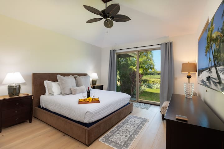Primaire suite met kingsize bed, eigen badkamer en lanai