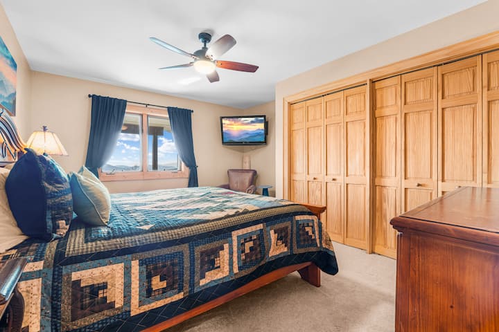 Drift into deep sleep in this cozy bedroom, featuring a beautifully crafted bed, soft lighting, and peaceful surroundings for total relaxation.