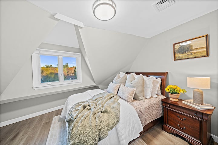 Shhhh...this room has a secret..It has the most stunning view of the farm (what you see in this photo through the window is not photoshopped).  
Enjoy a tranquil night of sleep in this comfy full bed.