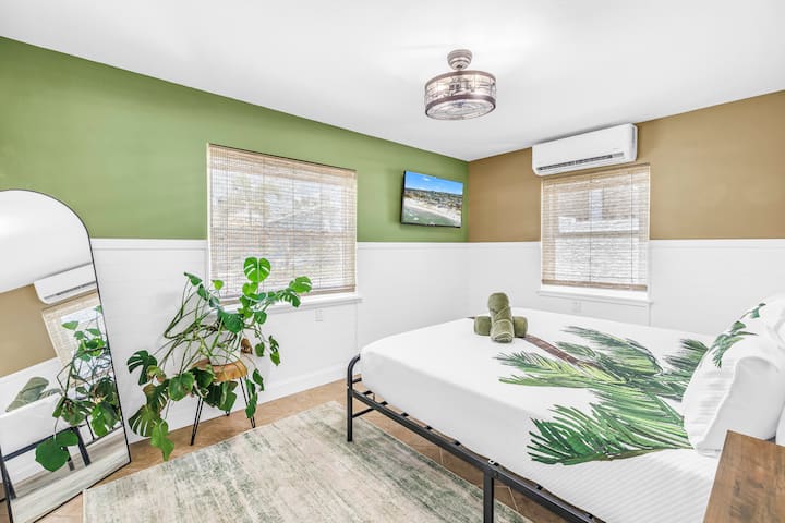 King size bed with personal TV, two closets and luggage rack.  Slippers and bathrobe provided