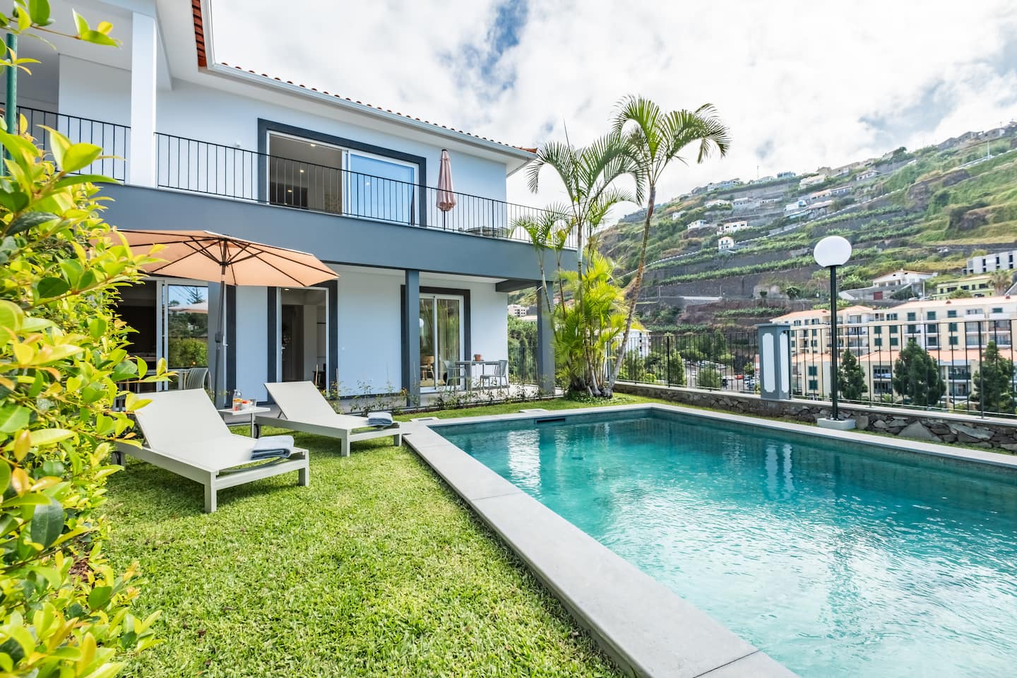 Villa Martha exterior with pool and garden