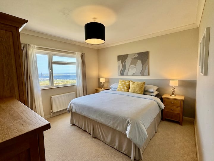 Ground floor 
Super King bed
Ensuite 
Sea views