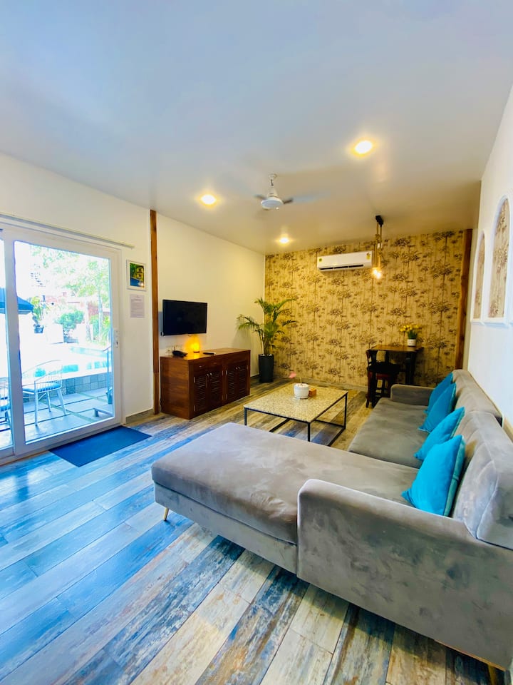 Specious Living Room which is attached with Kitchenette.