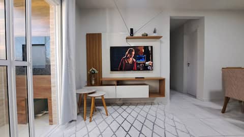 Successful Airbnb property: Complete ground floor apartment with garage, hot and cold AC, 3 bedrooms. in Tubarão