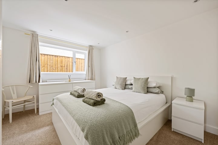 Drift into calm in this light and peaceful bedroom. Soft tones, plush bedding, and natural textures create a restful sanctuary where you can truly unwind. Wake refreshed, ready to enjoy another beautiful day in comfort at Casa Retreat.